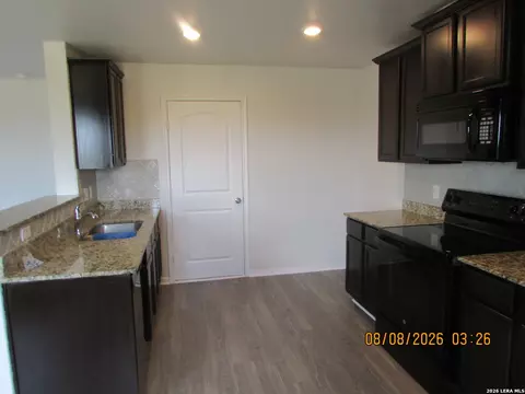 Kitchen - 15010 Silvertree Cv, Von Ormy, TX 78073 photo 1 of 2