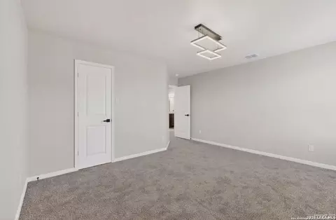 Bedroom - 15022 Harbor Lndg, Von Ormy, TX 78073 photo 4 of 5