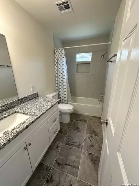 Bath - 907 Dove Ave, Devine, TX 78016 photo 2 of 2