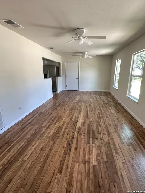 Living - 907 Dove Ave, Devine, TX 78016 photo 1 of 2