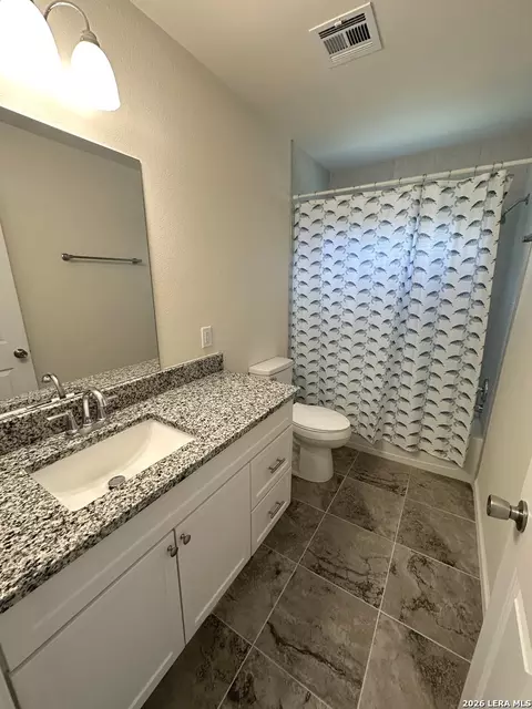 Bath - 907 Dove Ave, Devine, TX 78016 photo 1 of 2
