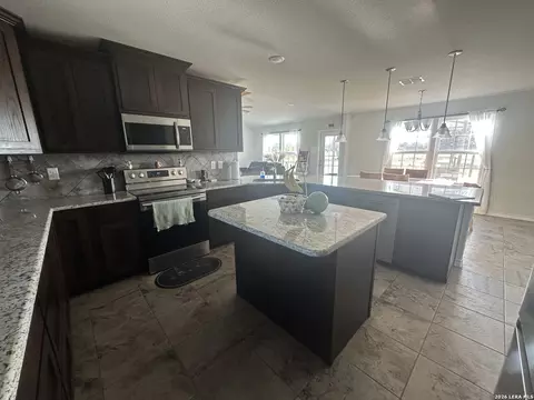 Kitchen - 2171 2155 County Road 5710, Devine, TX 78016 photo 2 of 4