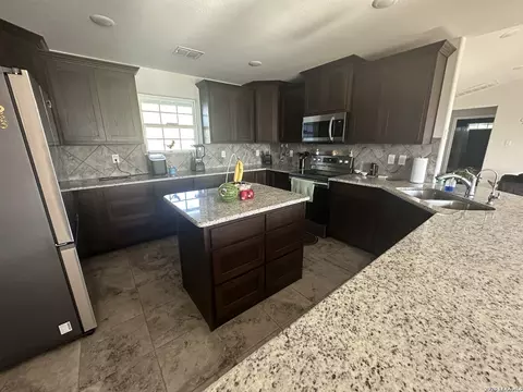 Kitchen - 2171 2155 County Road 5710, Devine, TX 78016 photo 3 of 4