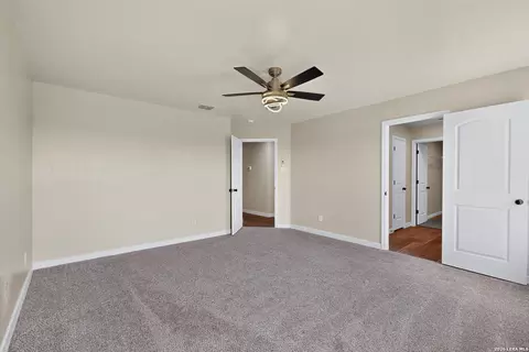 Bedroom - 15018 Silver Tree Cv, Von Ormy, TX 78073 photo 2 of 10