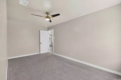 Bedroom - 15018 Silver Tree Cv, Von Ormy, TX 78073 photo 3 of 10