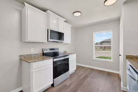Kitchen - 15018 Silver Tree Cv, Von Ormy, TX 78073 photo 1 of 2