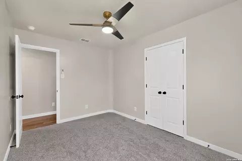 Bedroom - 15018 Silver Tree Cv, Von Ormy, TX 78073 photo 5 of 10
