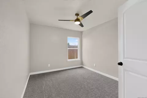 Bedroom - 15018 Silver Tree Cv, Von Ormy, TX 78073 photo 6 of 10