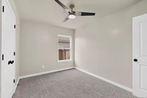 Bedroom - 15018 Silver Tree Cv, Von Ormy, TX 78073 photo 4 of 10