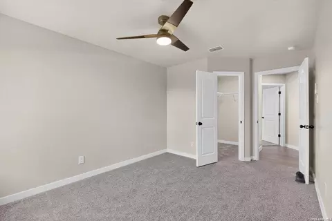 Bedroom - 15018 Silver Tree Cv, Von Ormy, TX 78073 photo 7 of 10