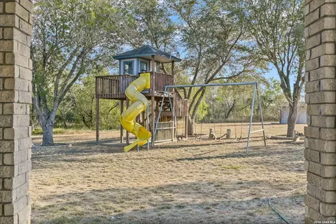 Exterior - 5280 Smith Rd, Von Ormy, TX 78073 photo 4 of 8
