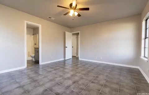 Bedroom - 302 Bain Dr, Devine, TX 78016 photo 2 of 3