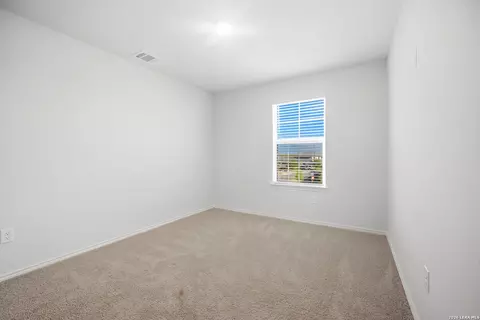 Bedroom - 15603 Garam Trl, Von Ormy, TX 78073 photo 2 of 5