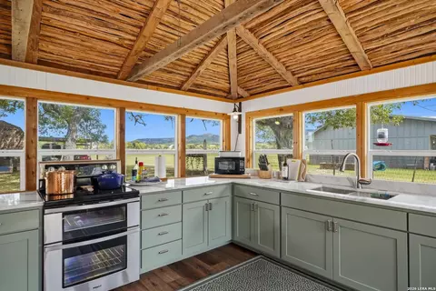 Kitchen - 809 Rivertree Rd, Leakey, TX 78873 photo 2 of 3