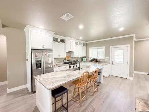 Kitchen - 300 Bluebonnet Ave, Devine, TX 78016 photo 1 of 3