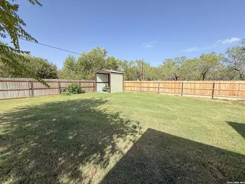 Exterior - 300 Bluebonnet Ave, Devine, TX 78016 photo 9 of 10