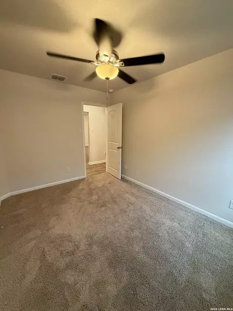 Bedroom - 15023 Harbor Lndg, Von Ormy, TX 78073 photo 2 of 11