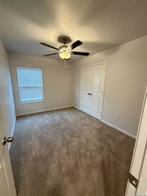 Bedroom - 15023 Harbor Lndg, Von Ormy, TX 78073 photo 3 of 11
