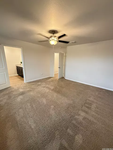 Bedroom - 15023 Harbor Lndg, Von Ormy, TX 78073 photo 6 of 11