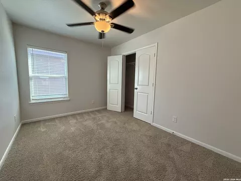 Bedroom - 15023 Harbor Lndg, Von Ormy, TX 78073 photo 9 of 11