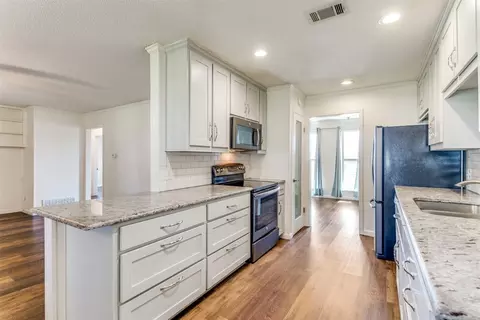 Kitchen - 200 E Pleasantview Dr, Hurst, TX 76054 photo 3 of 5