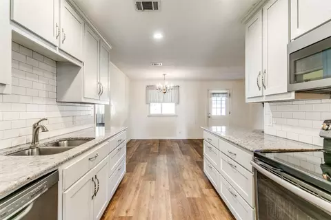 Kitchen - 200 E Pleasantview Dr, Hurst, TX 76054 photo 5 of 5