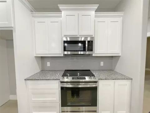 Kitchen - 122 E Harrison St, Denison, TX 75021 photo 4 of 6