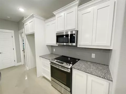 Kitchen - 122 E Harrison St, Denison, TX 75021 photo 3 of 6