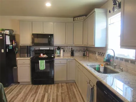 Kitchen - 215 E Thomas St, Leonard, TX 75452 photo 1 of 3