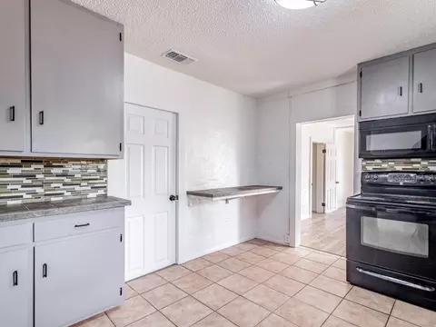 Kitchen - 306 W Hall St, Bangs, TX 76823 photo 3 of 4