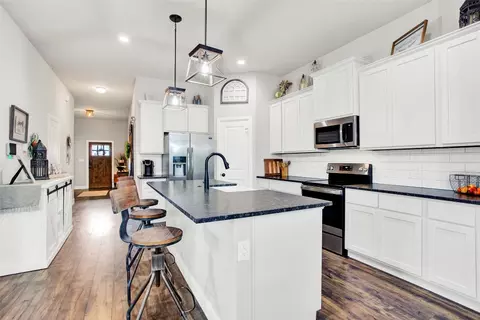 Kitchen - 311 Bronco Dr, Pilot Point, TX 76258 photo 2 of 3