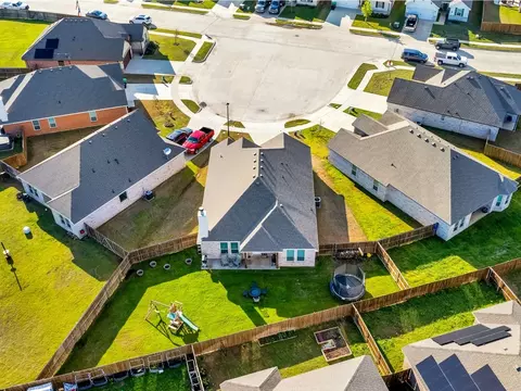 Exterior - 311 Bronco Dr, Pilot Point, TX 76258 photo 5 of 7