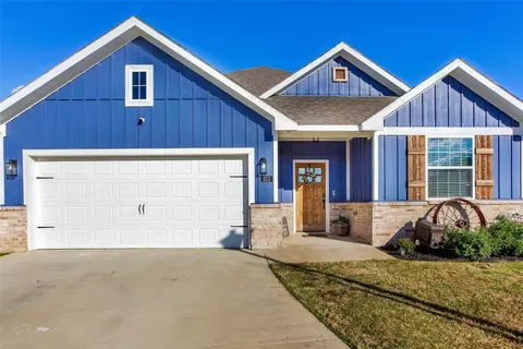 Exterior - 311 Bronco Dr, Pilot Point, TX 76258 photo 2 of 7