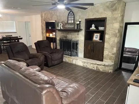 Living - 205 Shoshone St, Comanche, TX 76442 photo 2 of 2