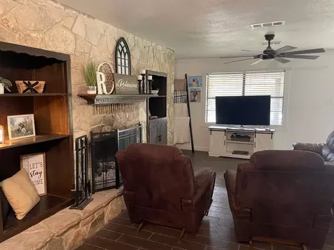 Living - 205 Shoshone St, Comanche, TX 76442 photo 1 of 2