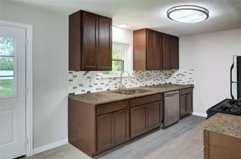 Kitchen - 402 E Fuller Dr, Euless, TX 76039 photo 2 of 3