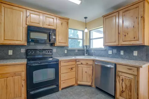 Kitchen - 210 E Arbor Ct, Springtown, TX 76082 photo 2 of 5