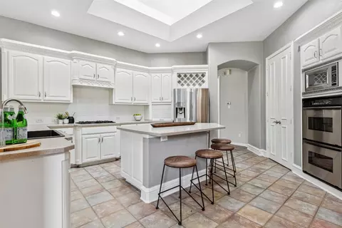 Kitchen - 317 E Carruth Ln, Double Oak, TX 75077 photo 2 of 3