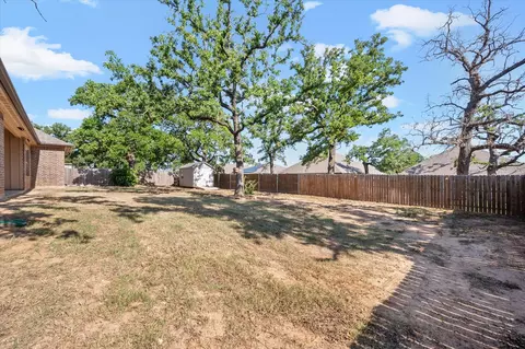 Exterior - 921 E 3rd St, Springtown, TX 76082 photo 6 of 7