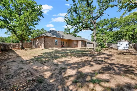 Exterior - 921 E 3rd St, Springtown, TX 76082 photo 5 of 7