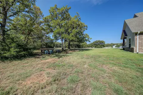 124 Whispering Oaks Trl, Sunset, TX 76270 photo 28