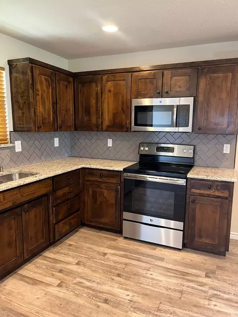 Kitchen - 2718 Monroe St, Commerce, TX 75428 photo 2 of 3