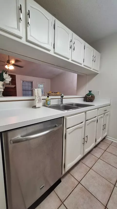 Kitchen - 890 E Riverside Dr, Grapevine, TX 76051 photo 2 of 3