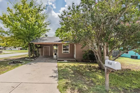 Exterior - 212 E 5th St, Springtown, TX 76082 photo 12 of 14