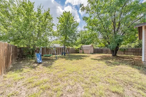 Exterior - 212 E 5th St, Springtown, TX 76082 photo 4 of 14
