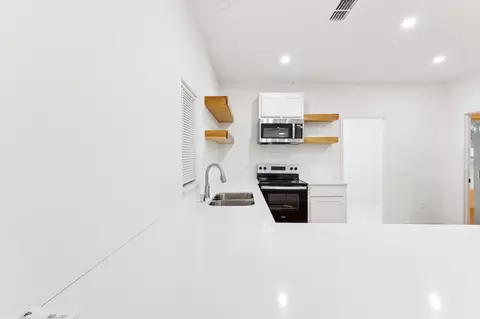 Kitchen - 115 E Heron St, Denison, TX 75021 photo 2 of 4