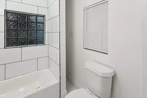 Bath - 115 E Heron St, Denison, TX 75021 photo 1 of 2