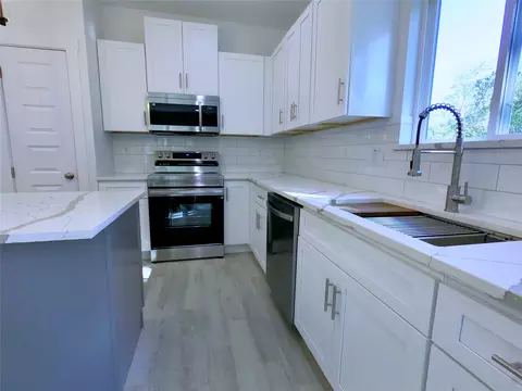 Kitchen - 1700 Dixie St, Commerce, TX 75428 photo 2 of 4