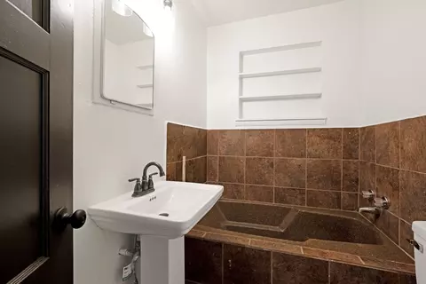 Bath - 304 N Pine St, Comanche, TX 76442 photo 1 of 2