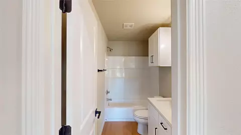 Bath - 703 Cedar St, Cleburne, TX 76031 photo 1 of 4